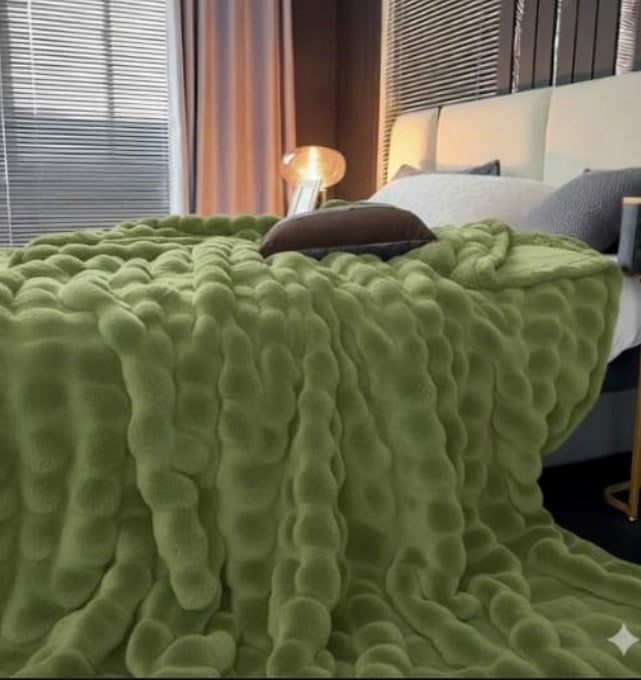 Cobija burbuja verde textura 3D en cama