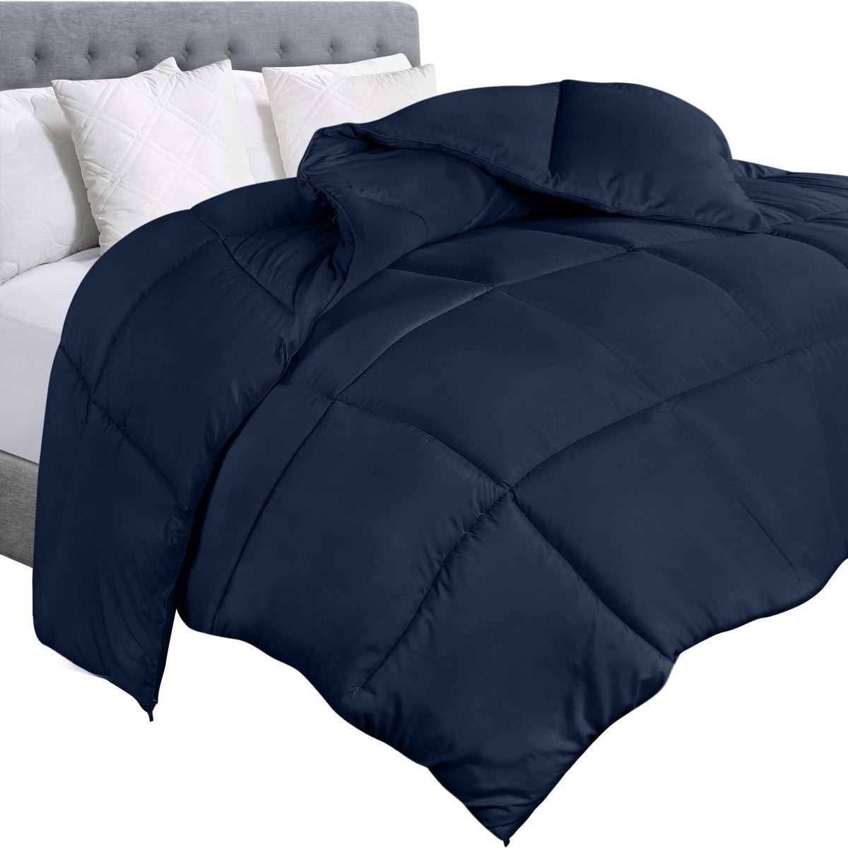 Edredon premium azul oscuro acolchado en cama