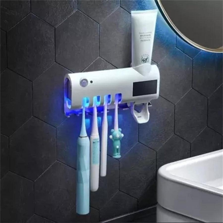 Dispensador de crema dental con portacepillos en la pared