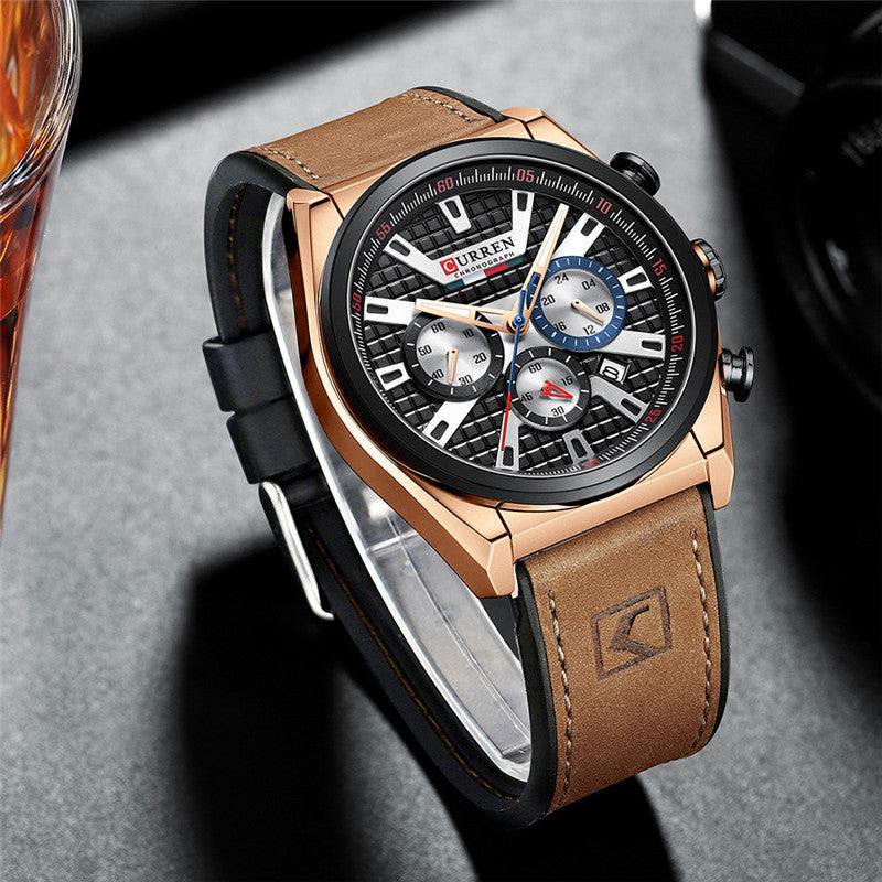 Reloj Curren 8392 café cobre sobre mesa
